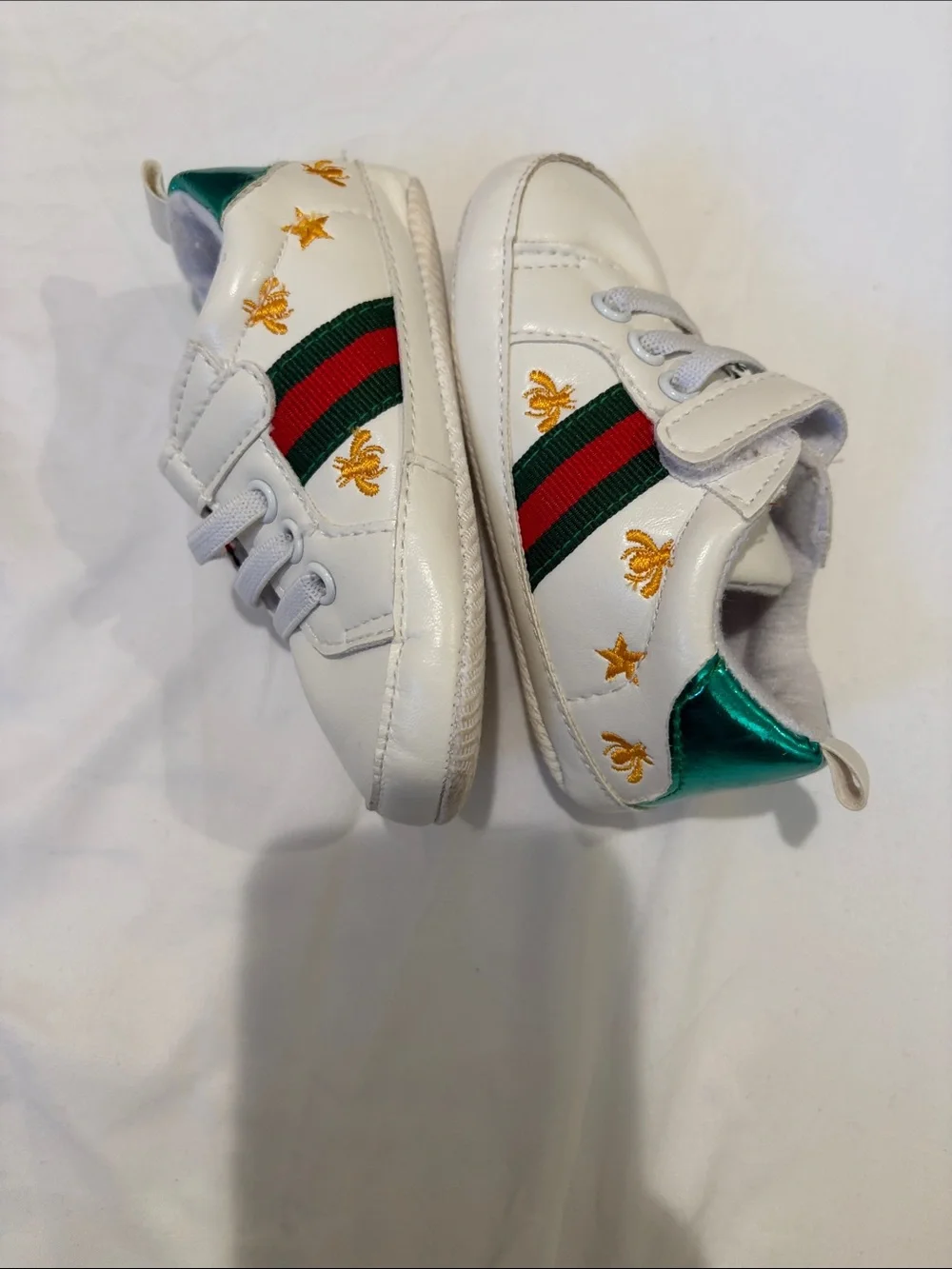 White Kids Sneakers with Green & Red Accent. Baby shoes
